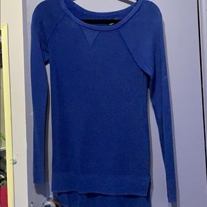 A blue sweater